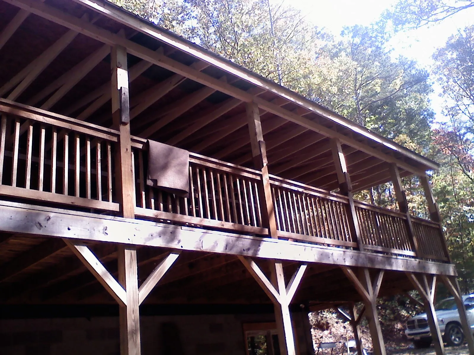 Timber framing under a new elevated porch and deck — Roof Leak Repair in Ledbetter by Roofing Brothers
